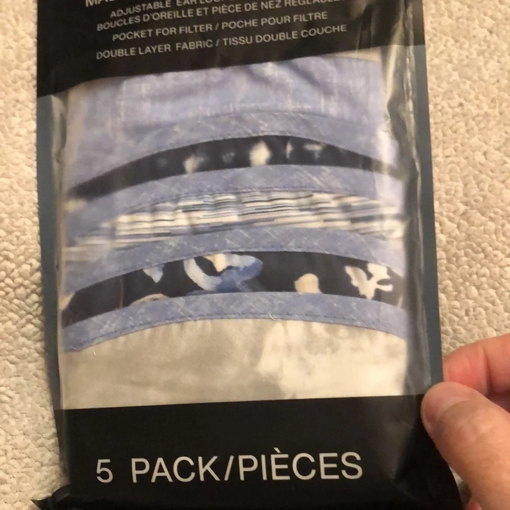 DKNY 5 pack face masks multi designs. Adjustable ear loops/nose piece. NWT